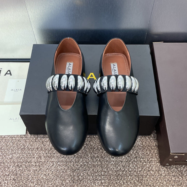 ALAIA MARY JANE FLATS 25S IN BLACK CALFSKIN WITH SILVER HARDWARE