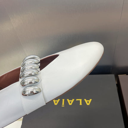 ALAIA MARY JANE FLATS 25S IN WHITE CALFSKIN WITH SILVER HARDWARE