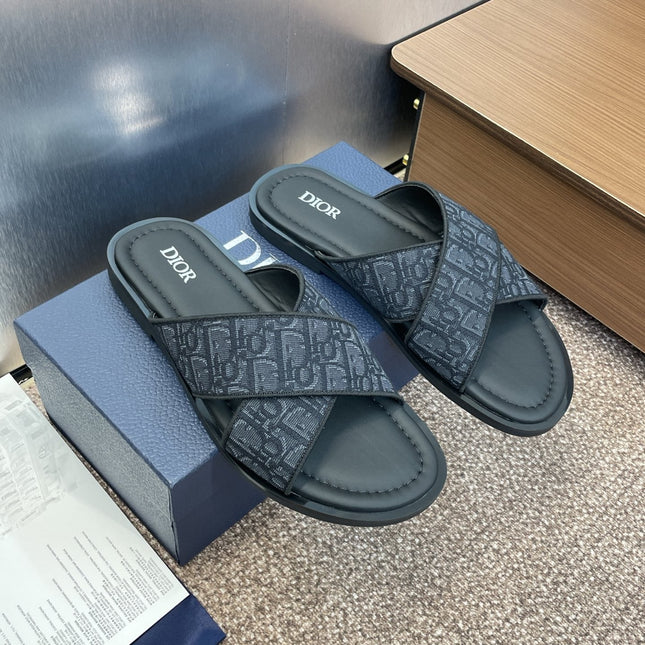 DIOR 25S ALIAS CROSS-STRAP SLIDES IN BLACK CALFSKIN WITH CD OBLIQUE DARK BLUE LOGO