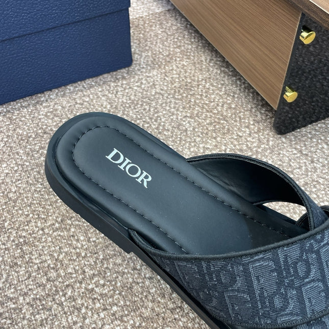 DIOR 25S ALIAS CROSS-STRAP SLIDES IN BLACK CALFSKIN WITH CD OBLIQUE DARK BLUE LOGO