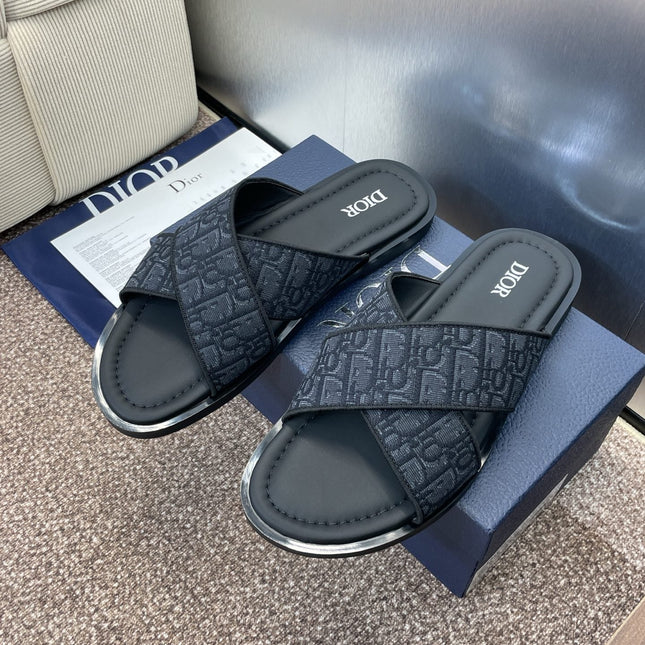 DIOR 25S ALIAS CROSS-STRAP SLIDES IN BLACK CALFSKIN WITH CD OBLIQUE DARK BLUE LOGO