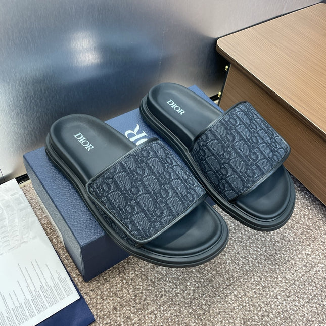 DIOR 25S ALIAS SLIDES IN BLACK CALFSKIN WITH CD OBLIQUE DARK BLUE LOGO
