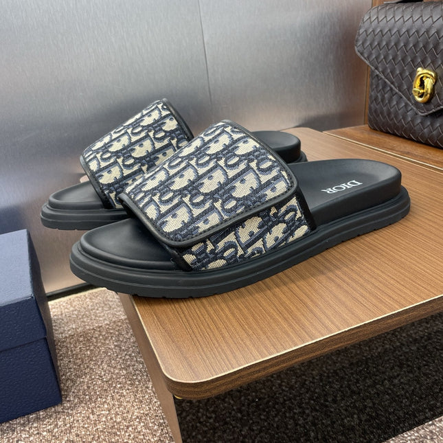 DIOR 25S ALIAS SLIDES IN BLACK CALFSKIN WITH CD OBLIQUE DEEP BLUE LOGO