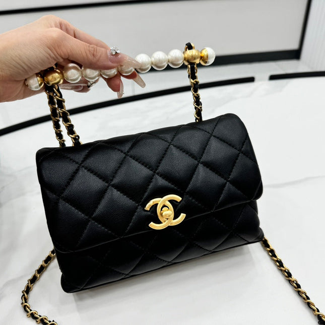CHANEL 25S FLAP BAG 19 CM IN BLACK LAMBSKIN WITH PEARL TOP HANDLE