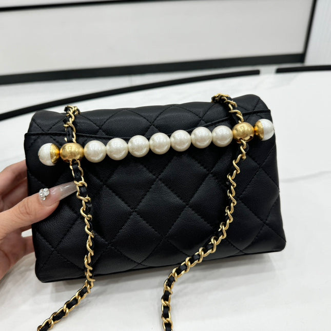 CHANEL 25S FLAP BAG 19 CM IN BLACK LAMBSKIN WITH PEARL TOP HANDLE