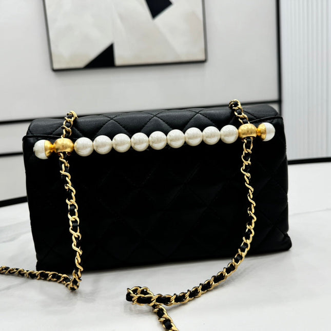CHANEL 25S FLAP BAG 23 CM IN BLACK LAMBSKIN WITH PEARL TOP HANDLE