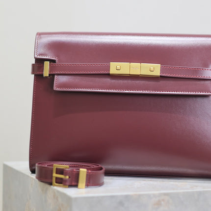 MANHATTAN MEDIUM 29 IN WINE RED SMOOTH CALFSKIN GOLD BUCKLE