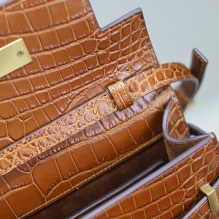 MANHATTAN SMALL 24 IN BROWN CROCODILE PATTERN CALFSKIN GOLD BUCKLE
