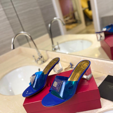 HIGH MULE 60MM IN COBALT BLUE SHEEPSKIN AND TRANSPARENT PVC