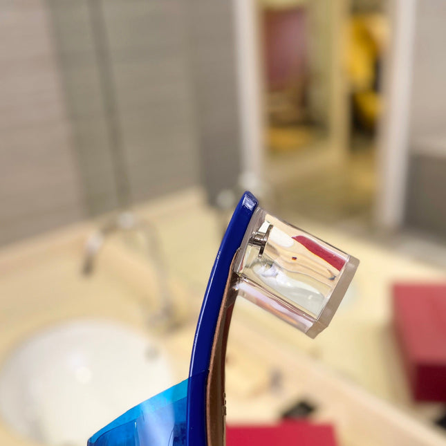 HIGH MULE 60MM IN COBALT BLUE SHEEPSKIN AND TRANSPARENT PVC