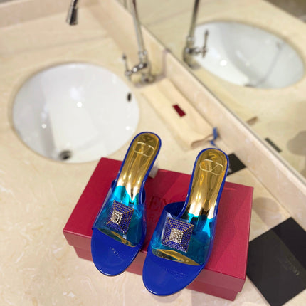 HIGH MULE 60MM IN COBALT BLUE SHEEPSKIN AND TRANSPARENT PVC