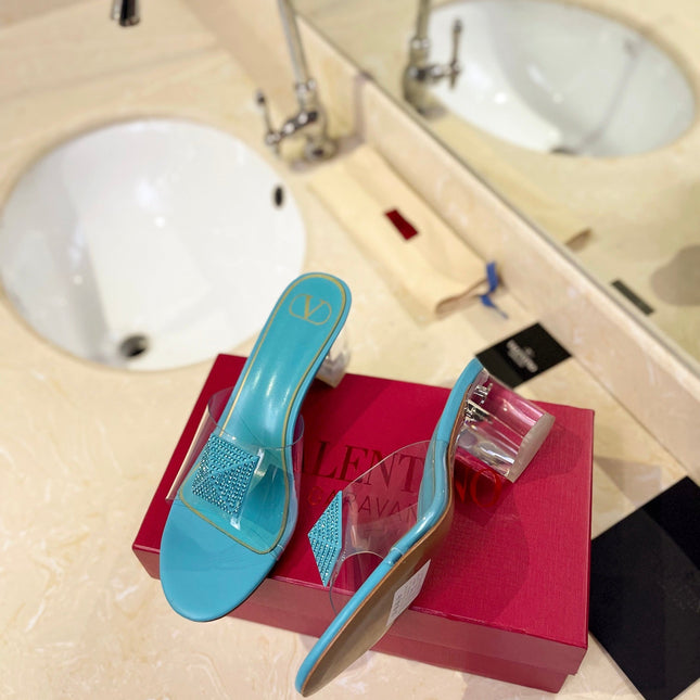 HIGH MULE 60MM IN AQUA BLUE SHEEPSKIN AND TRANSPARENT PVC