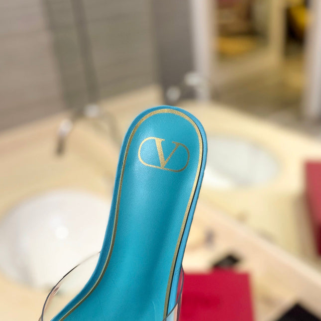 HIGH MULE 60MM IN AQUA BLUE SHEEPSKIN AND TRANSPARENT PVC