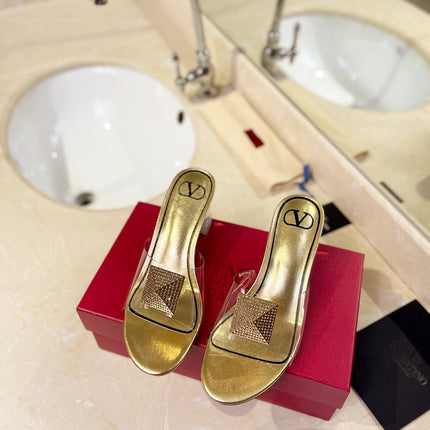 HIGH MULE 60MM IN GOLD SHEEPSKIN AND TRANSPARENT PVC