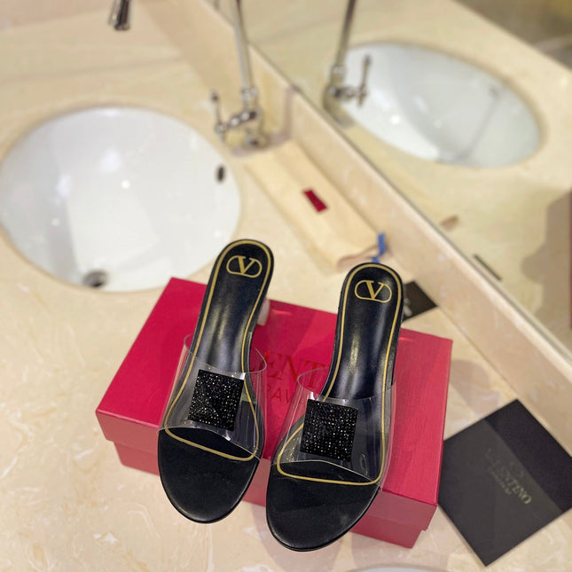HIGH MULE 60MM IN BLACK SHEEPSKIN AND TRANSPARENT PVC