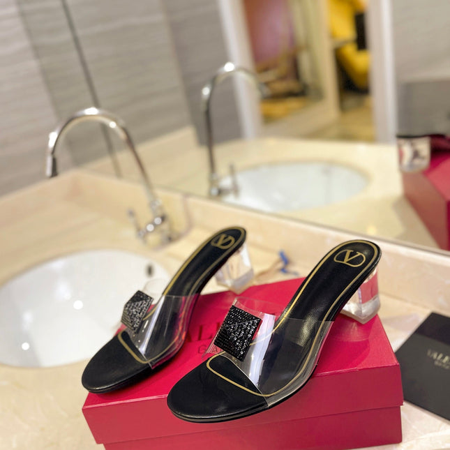 HIGH MULE 60MM IN BLACK SHEEPSKIN AND TRANSPARENT PVC