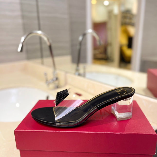 HIGH MULE 60MM IN BLACK SHEEPSKIN AND TRANSPARENT PVC