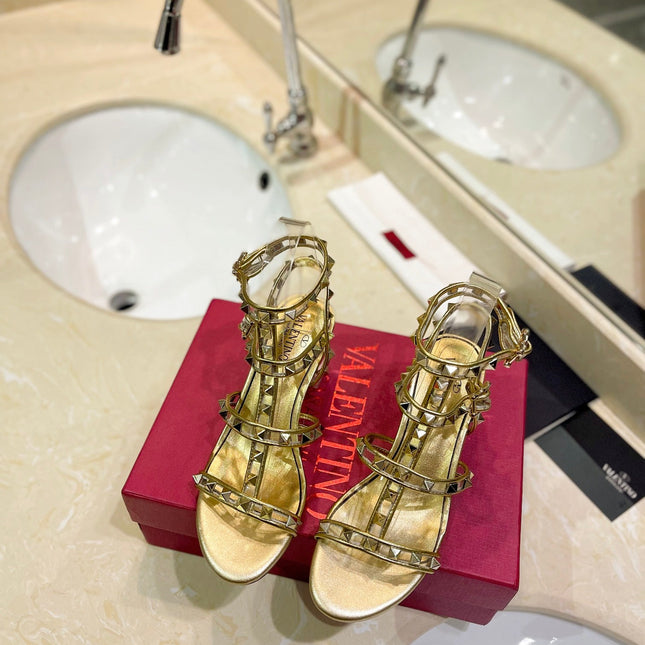 ROCKSTUD SANDAL WITH STRAP IN GOLD CALFSKIN 60 MM