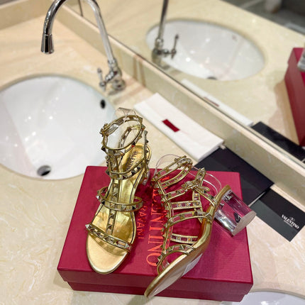 ROCKSTUD SANDAL WITH STRAP IN GOLD CALFSKIN 60 MM