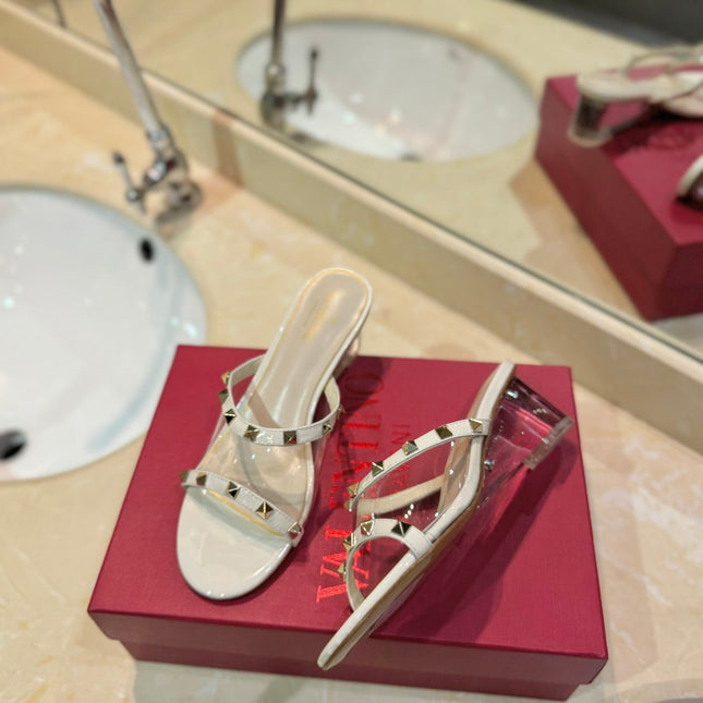ROCKSTUD MULE SANDALS IN WHITE CALFSKIN AND TRANSPARENT PVC FILM