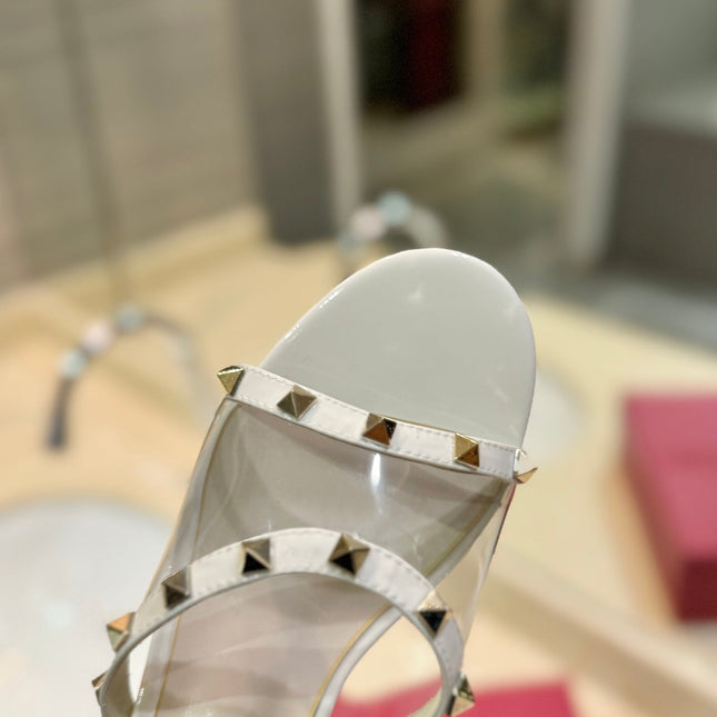 ROCKSTUD MULE SANDALS IN WHITE CALFSKIN AND TRANSPARENT PVC FILM