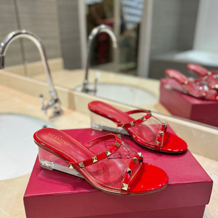 ROCKSTUD MULE SANDALS IN CHERRY RED CALFSKIN AND TRANSPARENT PVC FILM