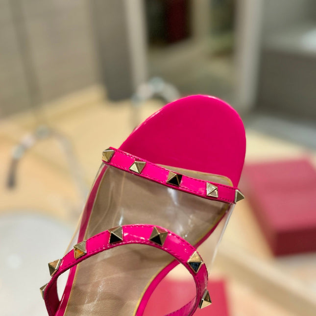 ROCKSTUD MULE SANDALS IN BRIGHT PINK CALFSKIN AND TRANSPARENT PVC FILM