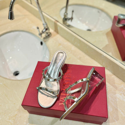 ROCKSTUD MULE SANDALS IN SILVER CALFSKIN AND TRANSPARENT PVC FILM