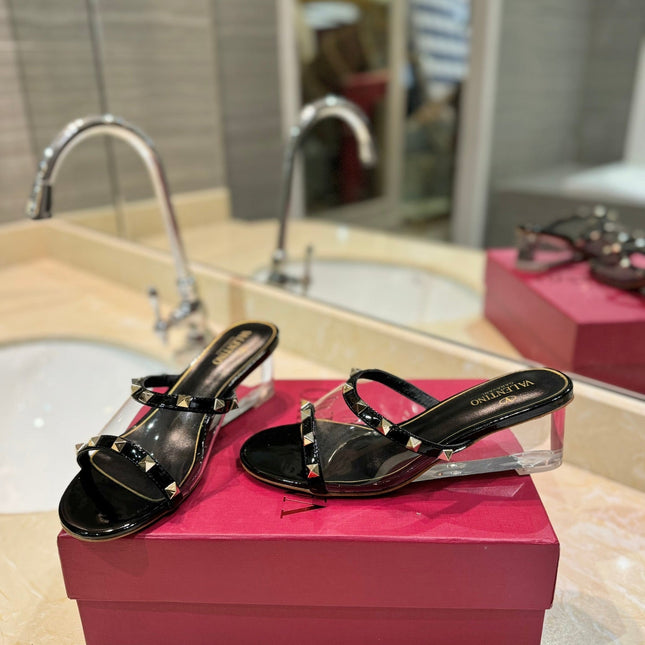 ROCKSTUD MULE SANDALS IN BLACK CALFSKIN AND TRANSPARENT PVC FILM