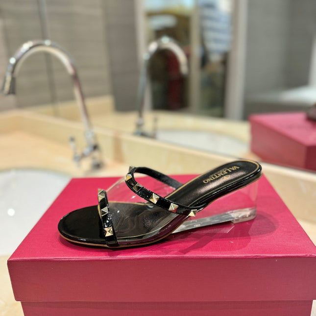 ROCKSTUD MULE SANDALS IN BLACK CALFSKIN AND TRANSPARENT PVC FILM