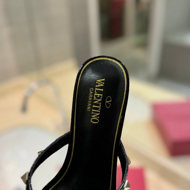 ROCKSTUD MULE SANDALS IN BLACK CALFSKIN AND TRANSPARENT PVC FILM