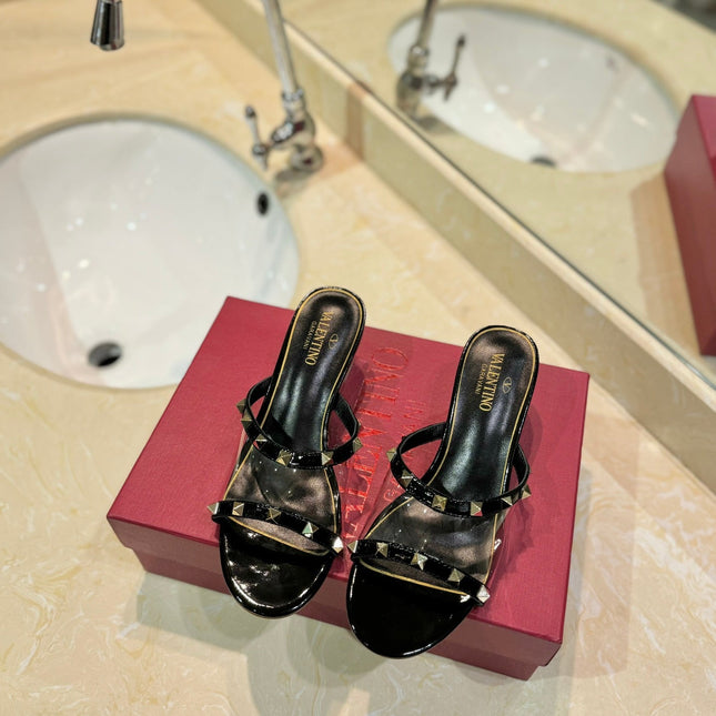 ROCKSTUD MULE SANDALS IN BLACK CALFSKIN AND TRANSPARENT PVC FILM