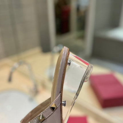 ROCKSTUD MULE SANDALS WITH TRANSPARENT HEEL IN CREPE PINK CALFSKIN