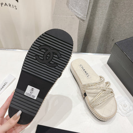 WOVEN STRAP SLIPPERS IN WHITE LAMBSKIN