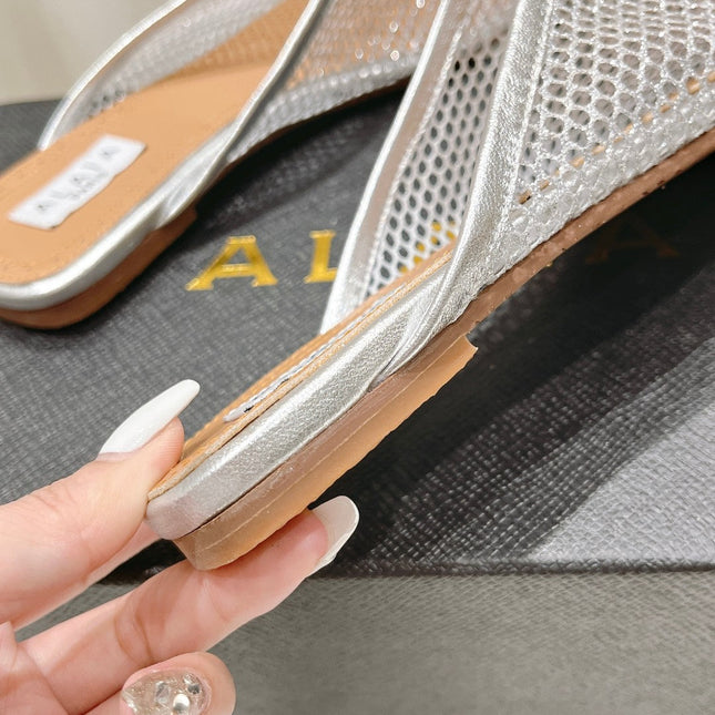 ALAIA FLAT MULES IN SILVER MESH FISHNET