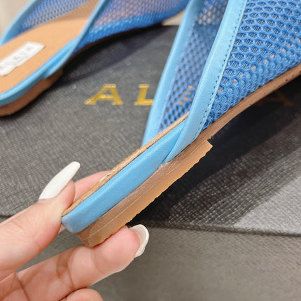 ALAIA FLAT MULES IN CERULEAN BLUE MESH FISHNET