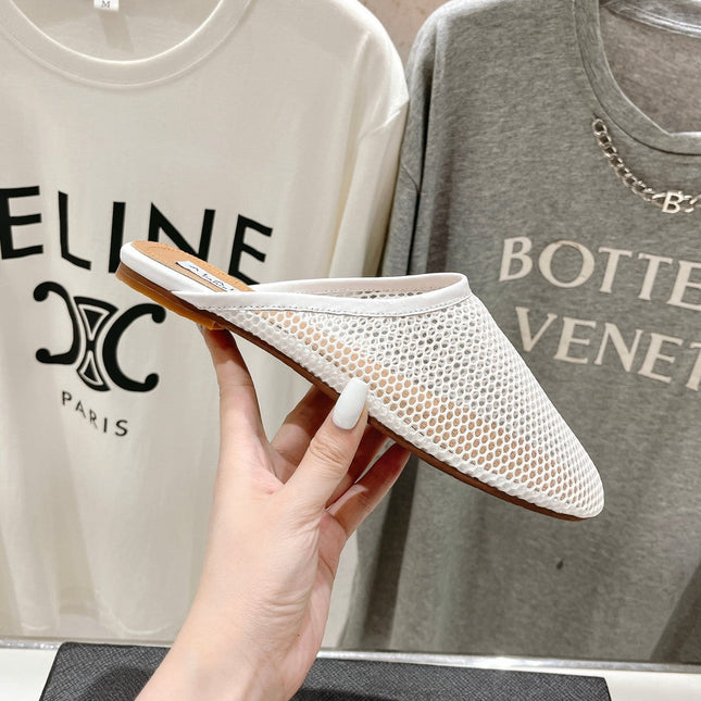 ALAIA FLAT MULES IN WHITE MESH FISHNET
