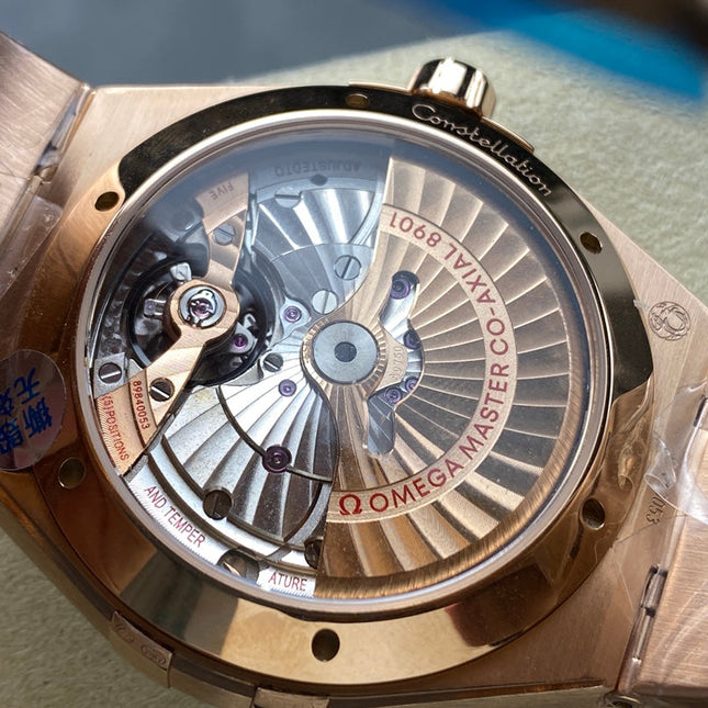 CONSTELLATION 39 MM WATCH ROSE GOLD CASE WITH NAVY BLUE DIAL