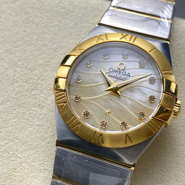 CONSTELLATION PETITE WATCH SILVER AND GOLD CASE
