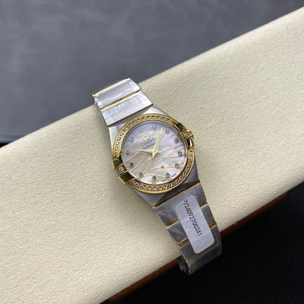 CONSTELLATION PETITE WATCH SILVER AND GOLD CASE WITH CRYSTALS