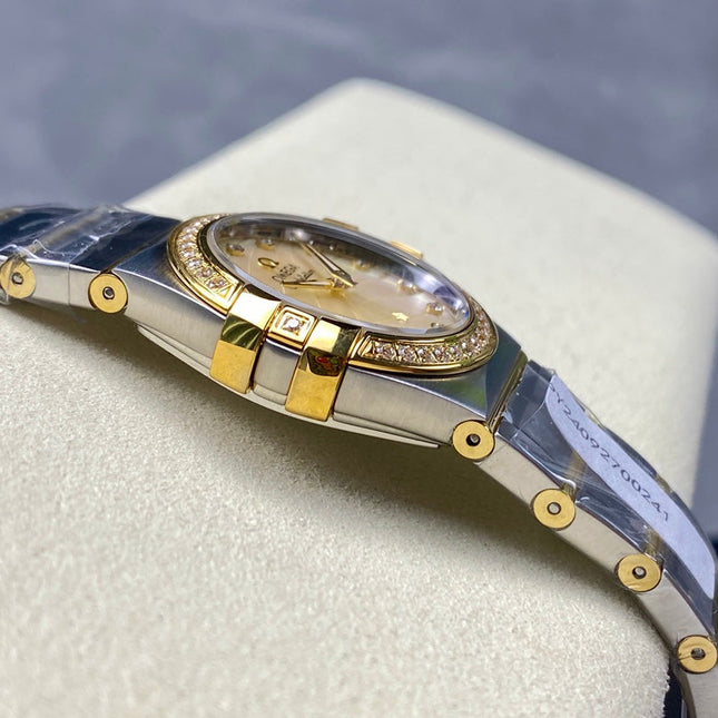CONSTELLATION PETITE WATCH SILVER AND GOLD CASE WITH CRYSTALS