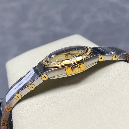 CONSTELLATION PETITE WATCH SILVER AND GOLD CASE WITH CRYSTALS