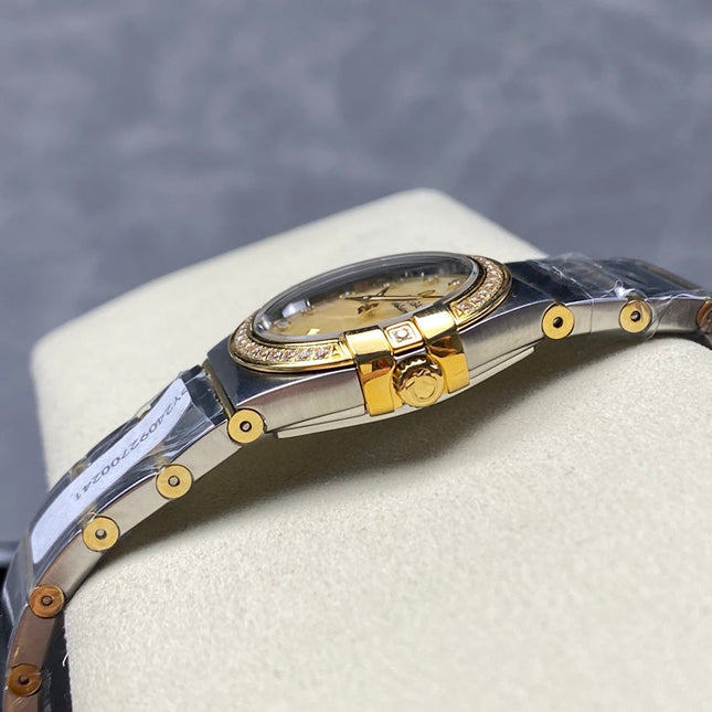 CONSTELLATION PETITE WATCH SILVER AND GOLD CASE WITH CRYSTALS