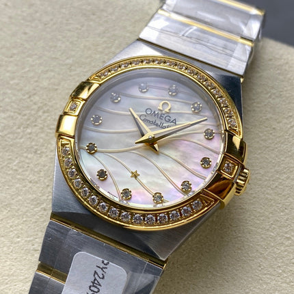 CONSTELLATION PETITE WATCH SILVER AND GOLD CASE WITH CRYSTALS