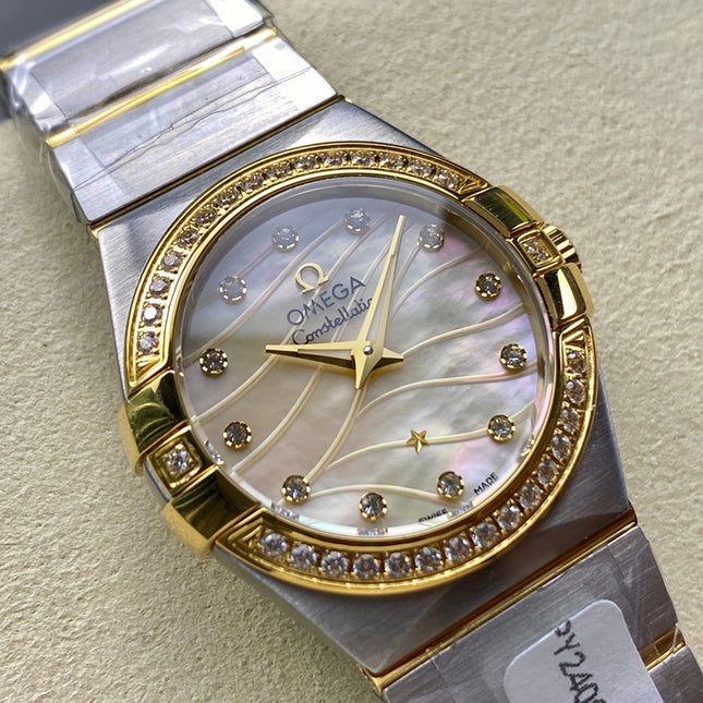 CONSTELLATION PETITE WATCH SILVER AND GOLD CASE WITH CRYSTALS