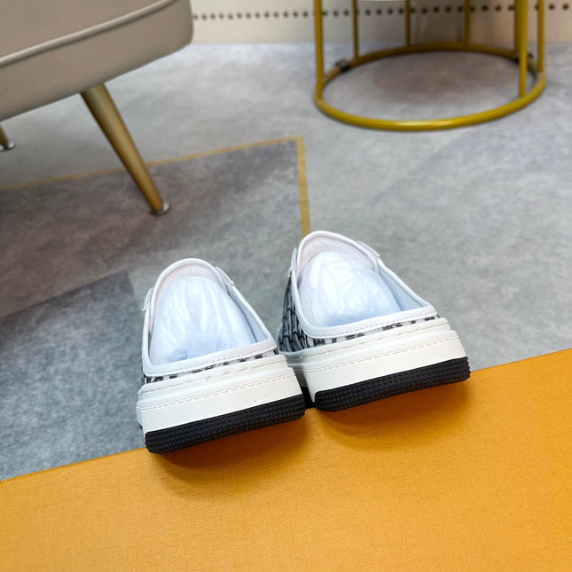 CD RETRO MULE WHITE AND BLACK CALFSKIN